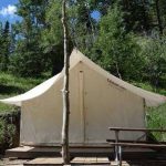 Glamping safari outfitters tent at Aspen Acres Campground in Rye CO