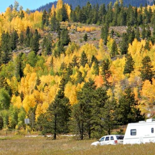 Aspen leaves and RV along Million Dollar Highway between Ouray, Silverton and Durango Colorado