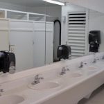 Ultra-clean, spacious bathrooms with showers and private dressing areas at Junction West RV Park (Grand Junction Colorado)