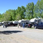 Mature trees and plenty of parking at Gunnison Lakeside RV Park and Cabins in Colorado