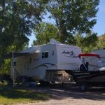 Plenty of shade, plus room for your toys at Gunnison Lakeside RV Park and Cabins in Colorado